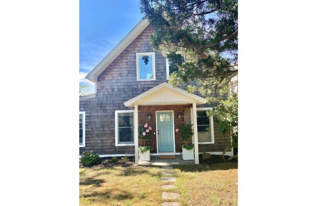 Waterfront home with private dock & bocce court!
