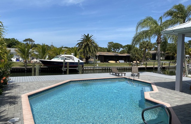 Waterfront Island Pool Home, Walk to Beach, dock your boat includes boat lift