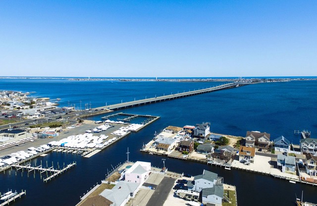 Waterfront Lagoon Retreat – 2BR Home with Private Dock, Bring Your Boat & Skis!