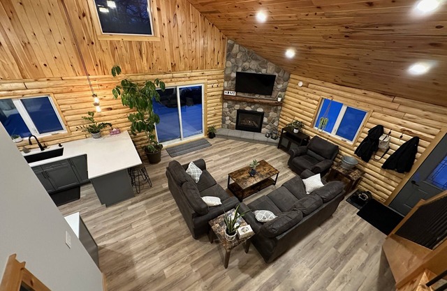 Waterfront Log Home with Beach and Hot Tub. Pet Friendly!