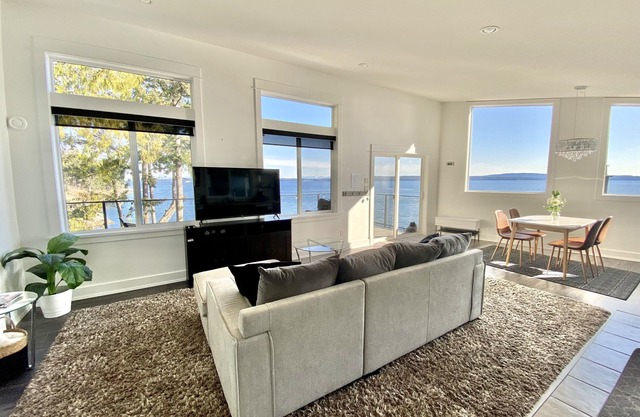 Waterfront suite with large deck and private hot tub