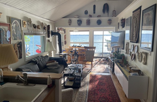 Waterfront with sunsets and sand bottom lake