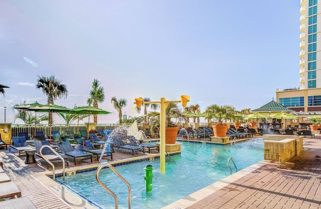 Waves and Sunshine Await! Oceanfront Stay w/ Pool and Full Kitchen
