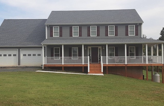 Welcome Home! New luxurious home awaits - large family room w/ fireplace.