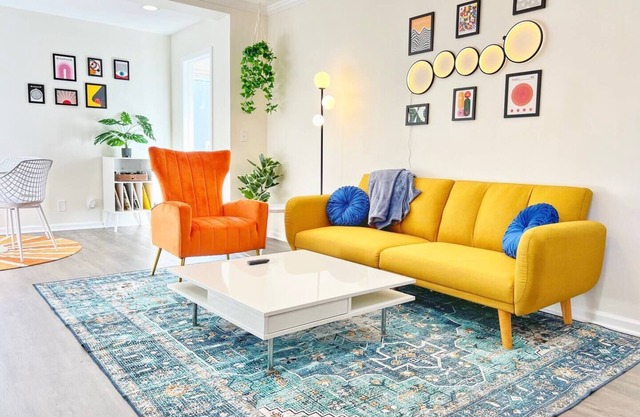 Welcome to our vibrant 2-bedroom, 1-bathroom abode, where retro charm meets modern comfort