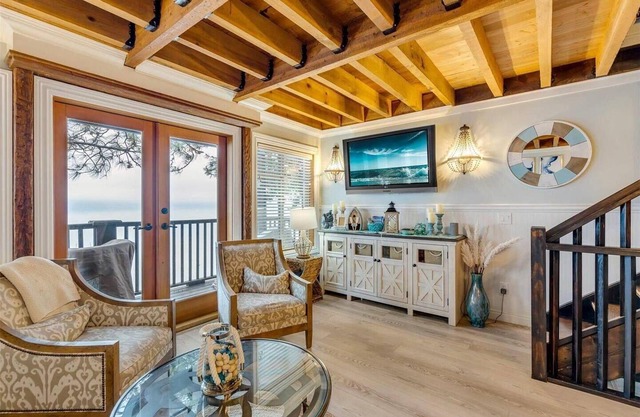 Welcome to The Secret Point, your private lakeside haven nestled down Westside Road
