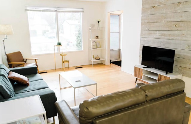 Welcoming 5-bedroom home with spacious deck and yard!
