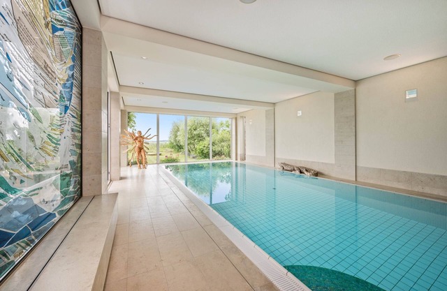 Wellness Apartment mit Pool (27 Grad), Sauna, Fitness und Wasserblick