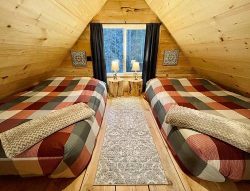 Wind Down Log Cabin in the Woods with Cozy Woodstove