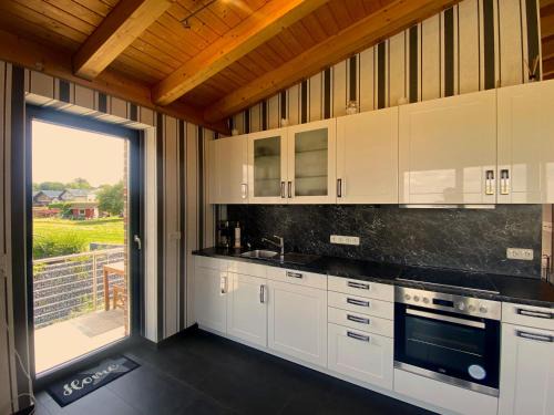 Wohnung in Schmidt mit Grill und Garten
