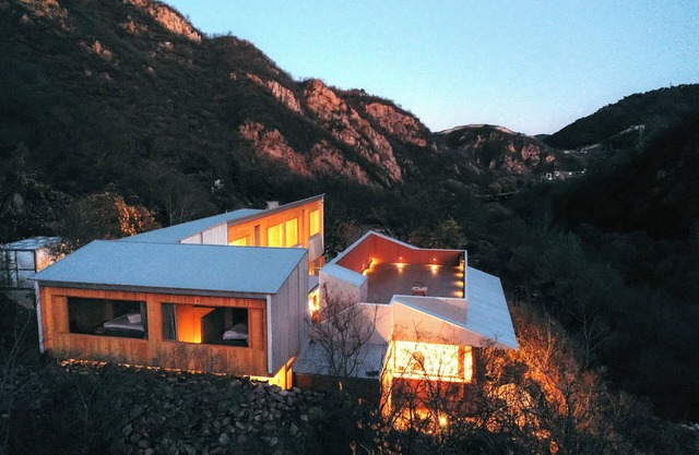 Wooden house at the foot of the Great Wall, Beijing, China. Outdoor experiences!