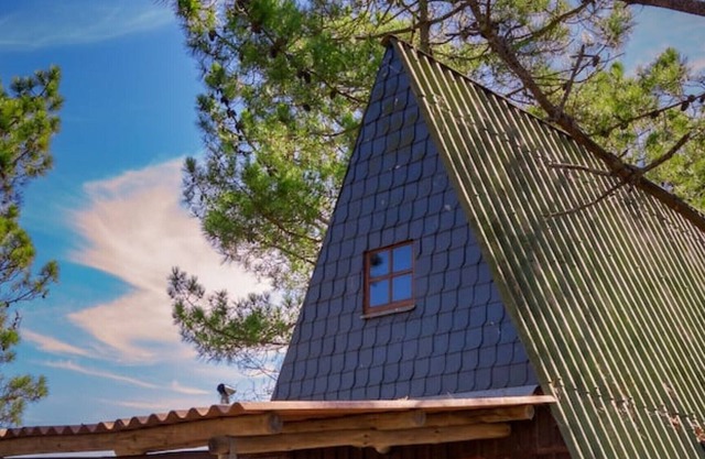 Wooden house overlooking the sea
