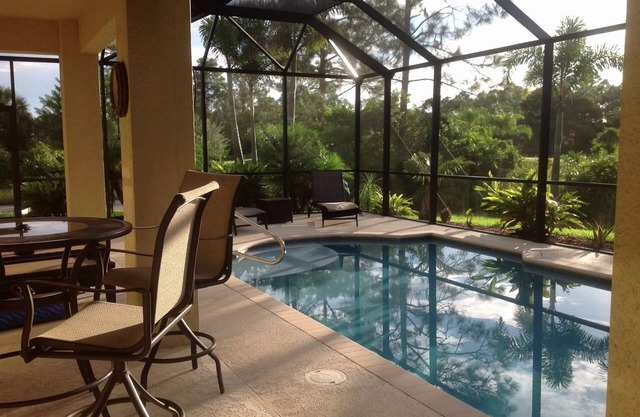 WOW!! Stunning 3-Bedroom HEATED Pool Home: Your Private Oasis Awaits!