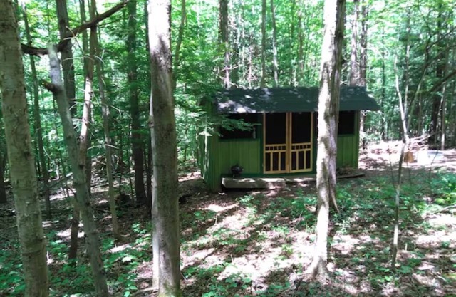Writer's Den: Rustic Retreat Camping Cabin