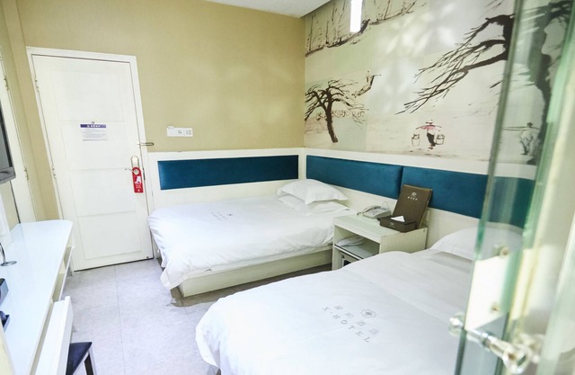 Xinghe Xinfeng Hotel - Railway Station