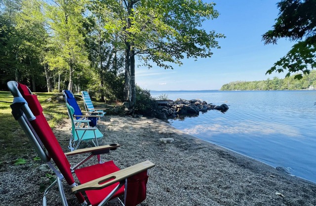 YEAR ROUND PRIVATE WATERFRONT Camp with Your Own Sandy Beach on East Grand Lake!