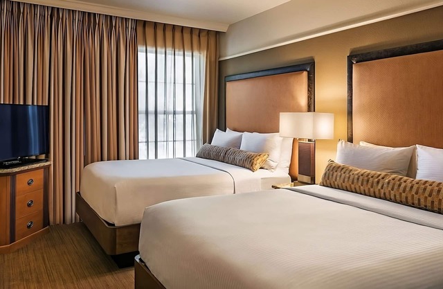 Your Gateway to Scottsdale's Wonders: Elegant Suites Await! Paws Friendly, Pool