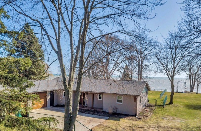 YOUR OWN PRIVATE BEACH GETAWAY! Fantastic 3 Bed 2 Full Bath LAKE FRONT Home!