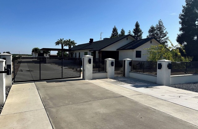 Your private pool with this “Modern Oasis" in the country. Gateway to it all.