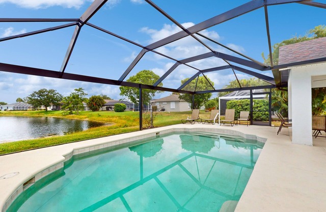 Sweet & spacious Fort Myers Beach retreat with pond-view pool & screened patio