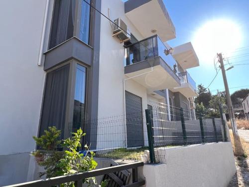 Dalyan Mahallesi Wohnung | Çeşme'de denize yakın, bahçeli ev