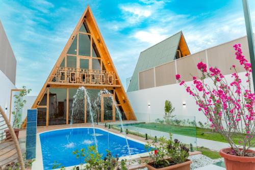 Al Kura Skihütte | شاليهات اكواخ كايا الفندقية