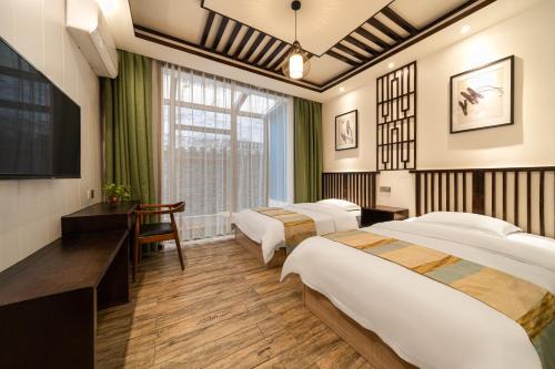 Fenghuang Haus | 凤凰又见青檐民宿