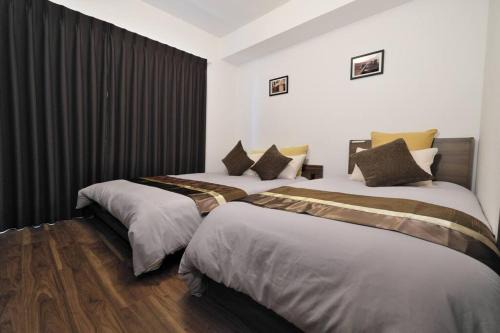 Marunouchi Wohnung | 書斎でくつろぐスイートルーム