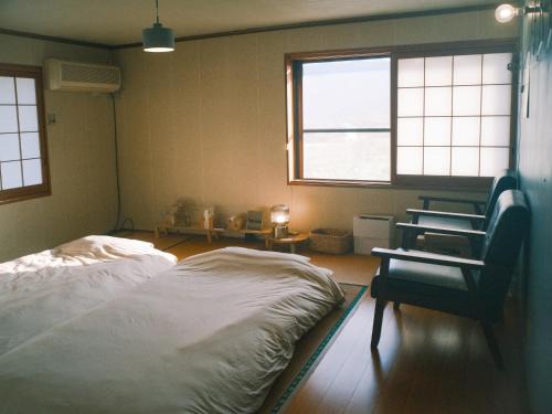 Mima Haus | 泊まれる本屋 まるとしかく