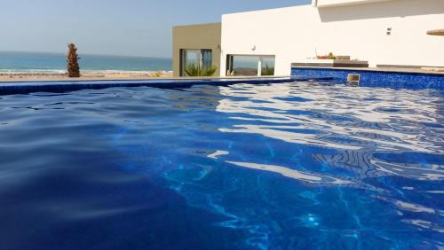 Ayir Haus | 2 bungalows avec vue sur mer et piscine PARTAGEE