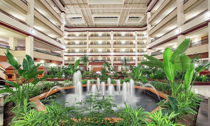 Lexington Hotel | 2 Connecting Suites with Three Beds and Two Sofabeds at a Full Service Hotel by Suiteness