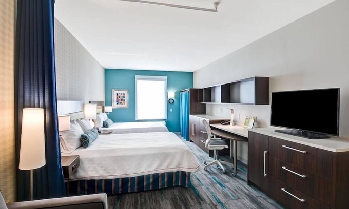 Conway Wohnung | 2 Connecting Suites with 4 Beds and Two Sofabeds at a Full Service Hotel by Suiteness
