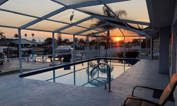 Gulf Harbors Haus | Tauchen Sie in unser Paradies ein und wohnen Sie am Golf von Mexiko mit Ihrem eigenen beheizten Pool und Boot