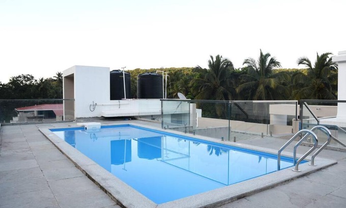 Bogmolo Wohnung | 2BHK AC Apartment with Swimming pool close to beach and Airport!