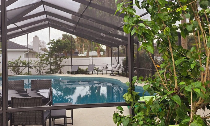 Deep Forest Village Haus | 4 bedroom pool house close to daytona beach