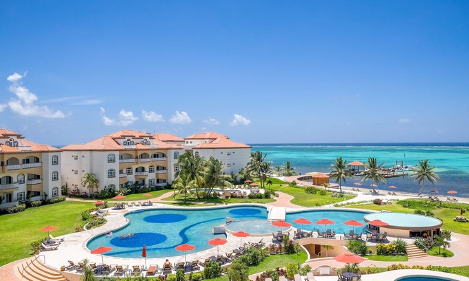 San Pedro Eigentumswohnung | 5 Sterne Beach Front Luxury Resort Grand Caribe * Kürzlich aktualisiert * KOSTENLOSE Fahrräder *
