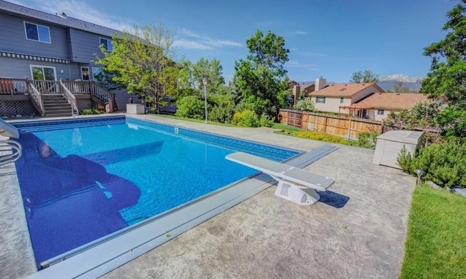 Briargate Haus | 6BR with Pool & Water Slide, Hot Tub, Peak View