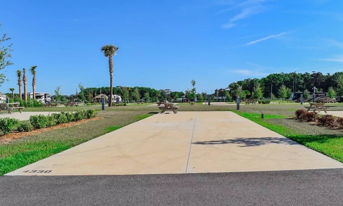 Fellowship Wohnmobilvermietung | 70' RV Pad at Champion's Run Luxury RV Resort with full hookups