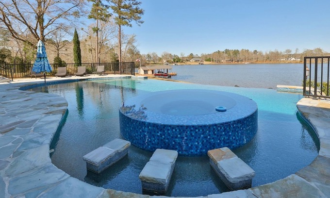 Macon Haus | 7BR Lakefront Haven Pool Hot Tub Gated 4acres