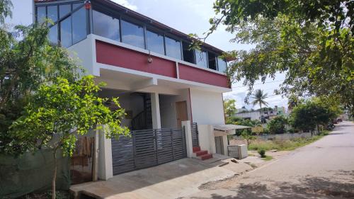 Vijayanagar Haus | A spacious AC room with wide Balcony -Karimbumel House a perfect place for yoga practicioners