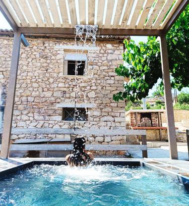 Corinth Haus | Agios Ioannis Stone Cottage with Private Heated Pool & Hydro-massage