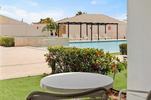 Washington Haus | AL117 -Resort Pool-Beach Tennis court- 2BR condo-Close to Palm Beach