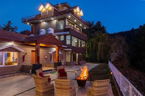 Theog Haus | Alaya Stays Lafu House Hearth Room with Cabana Hill views