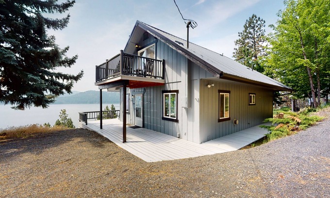 Harrison Haus | Amazing lake-view cabin with balcony, firepit, grill, wood stove, & W/D