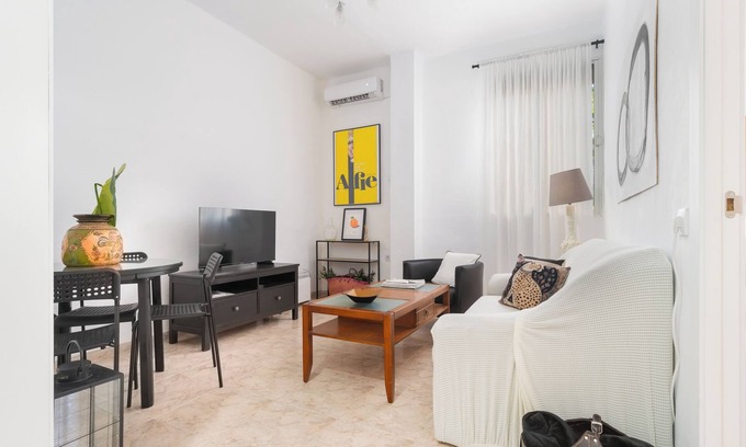 La Palmera-Reina Mercedes Wohnung | Apartment 'La Naranja De Reina Mercedes' with Wi-Fi and Air Conditioning