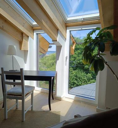 Seeshaupt Wohnung | Apartment unterm Dach mit kleinem Seeblick