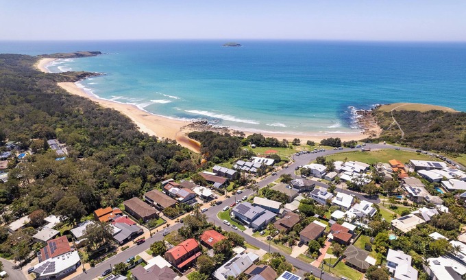 Emerald Beach Haus | Beach Cockatoo, Sleeps 4, start your day with a surf or walk on the beach