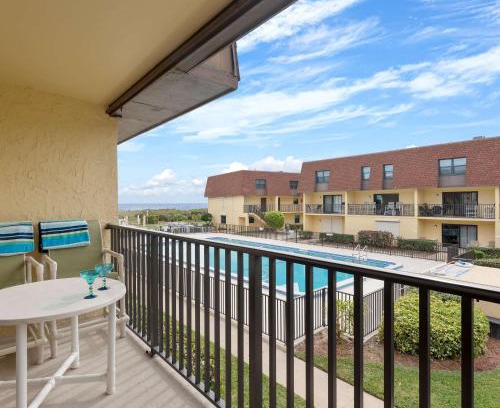 Avon By The Sea Haus | Beachfront 2BR Condo with Pool BBQ & Steps To Beach