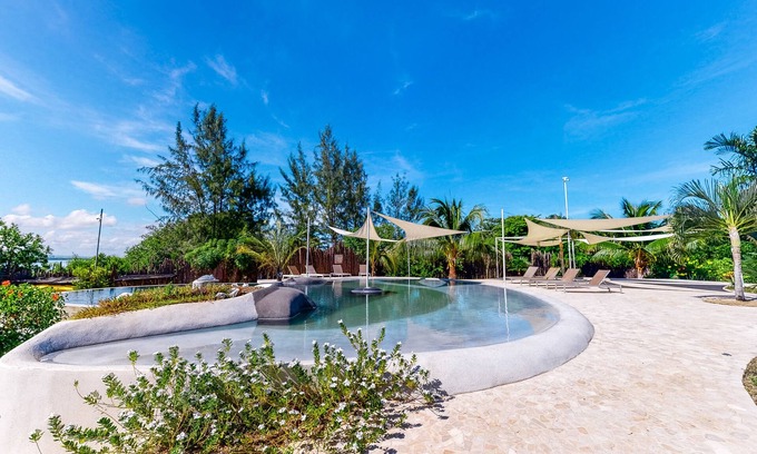 Cocoplum Villa | Romantischer Rückzugsort am Strand mit Gemeinschaftspool und Meerblick!