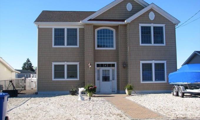 Beach Haven West Haus | Beautiful 2200 sq ft home Sleeps 10 Bring your water toys!